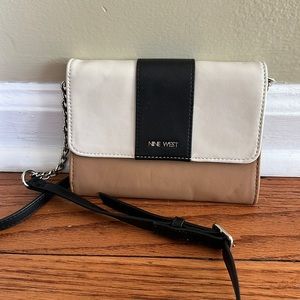 Nine West shoulder clutch. Black, white, tan